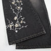Retro Black Denim Flared Jeans with White Plant Embroidery